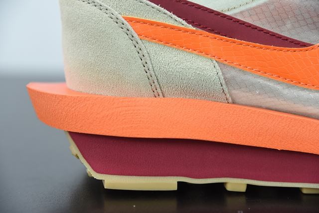 279481632024995_19-1 Sacai Waffle Kiss Of Death Net Orange front view