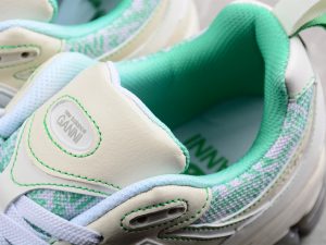 New Balance 2002R Turtledove Island Green front view
