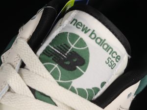 New Balance 550 Shoes White Pine Green Black front view